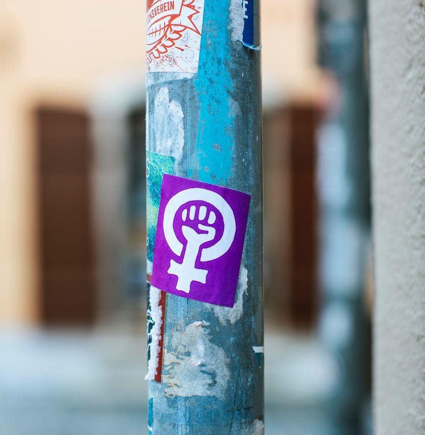 street pole with colorful stickers